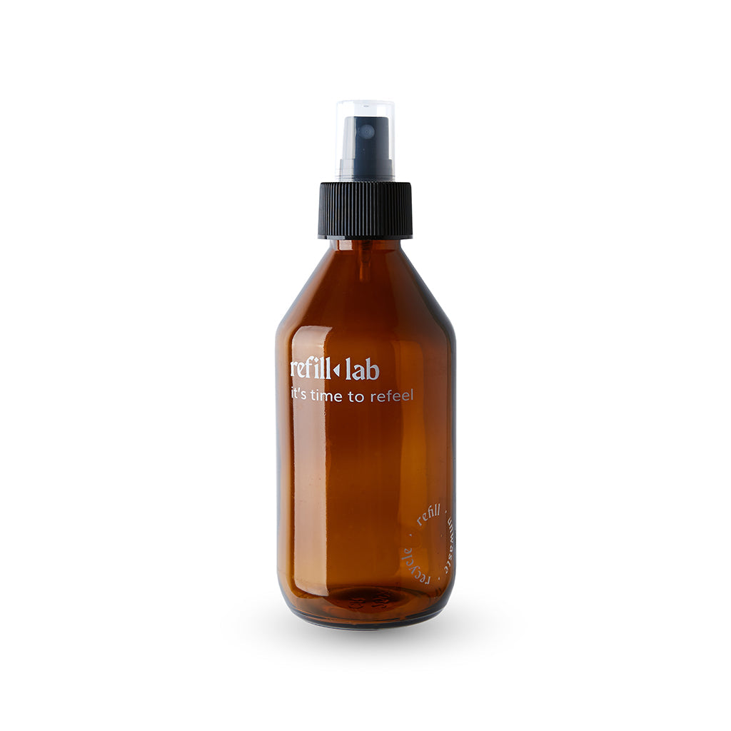 Envase vidrio redondo ambar con válvula spray